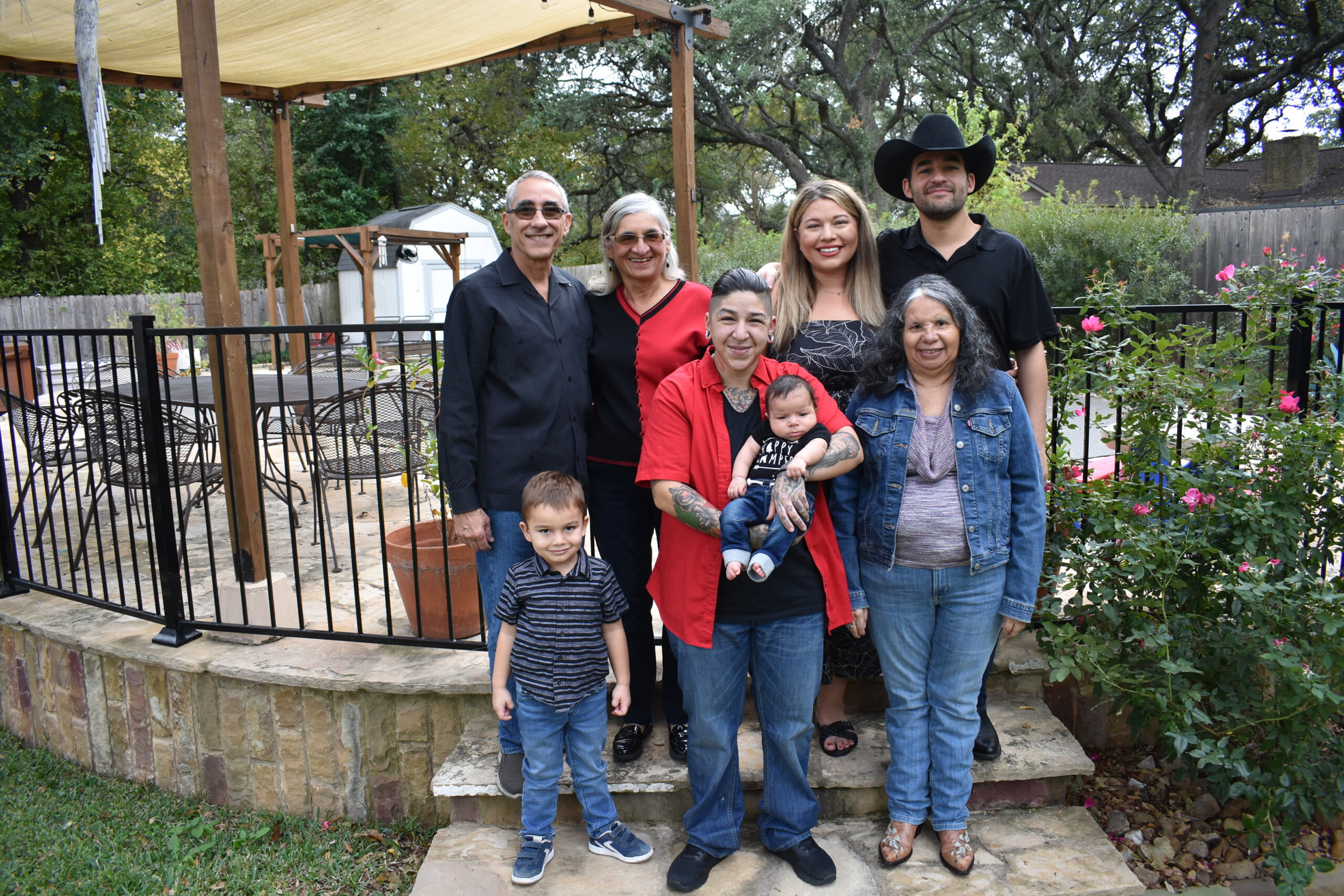 The de la Teja family in our backyard. Top row. left to right: Frank and Maggie, London and Eduardo; second row, left to right: Cru, Julia, Kai, and Maggie's sister Dora.